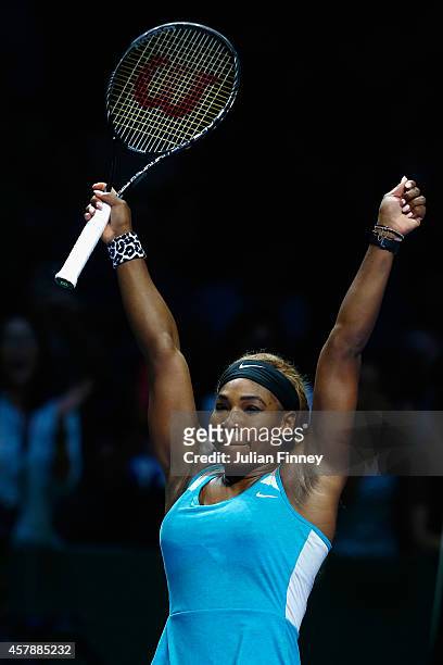Serena Williams of USA celebrates at match point as she defeats Simona Halep of Romania in the final during day seven of the BNP Paribas WTA Finals...