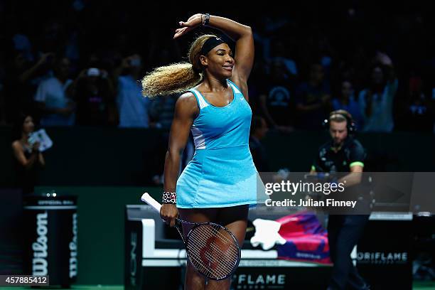 Serena Williams of USA celebrates at match point as she defeats Simona Halep of Romania in the final during day seven of the BNP Paribas WTA Finals...