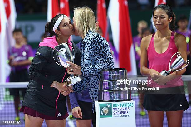 Sania Mirza of India with Martina Navratilova and the Martina Navratilova Trophy after their straight sets victory against Su-Wei Hsieh of Chinese...