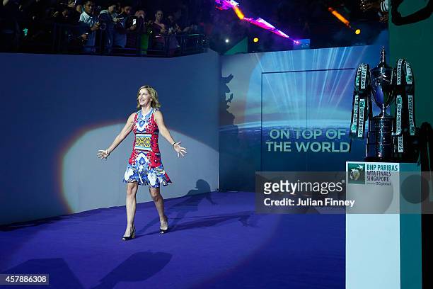 Chris Evert arrives on court before the final during day seven of the BNP Paribas WTA Finals tennis at the Singapore Sports Hub on October 26, 2014...