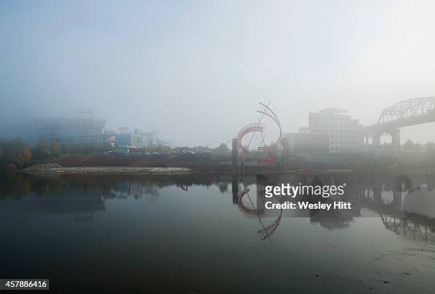Field emerging from the early morning fog off the Cumberland River before a game between the Tennessee Titans and the Houston Texans on October 26,...