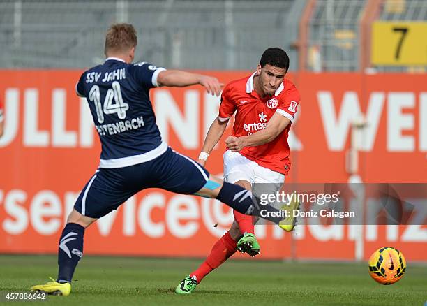 Fabian Trettenbach of Jahn Regensburg challenges Mounir Bouziane of... News  Photo - Getty Images