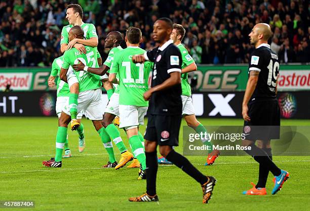 Naldo of Wolfsburg celebrate his team's 2nd goal during the Bundesliga match between VfL Wolfsburg and 1.FSV Mainz 05 at Volkswagen Arena on October...