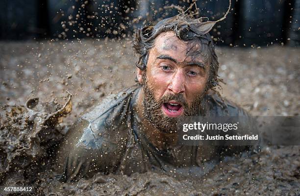 Competitor takes part in the Tough Mudder London South on October 26, 2014 in Winchester, England. The world-famous Tough Mudder is military style...