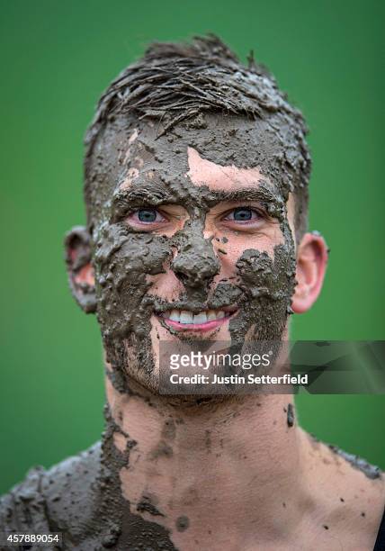 Competitor poses for a portrait during the Tough Mudder London South on October 26, 2014 in Winchester, England. The world-famous Tough Mudder is...