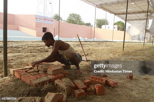 Preparation for upcoming festival Chhatt Pooja in full swing at Chhatt Ghat on Yamuna on October 26, 2014 in New Delhi, India. Chhath puja is...