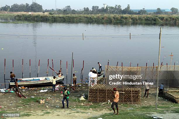 Preparation for upcoming festival Chhatt Pooja in full swing at Chhatt Ghat on Yamuna on October 26, 2014 in New Delhi, India. Chhath puja is...