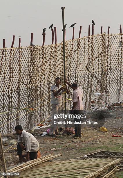 Preparation for upcoming festival Chhatt Pooja in full swing at Chhatt Ghat on Yamuna on October 26, 2014 in New Delhi, India. Chhath puja is...