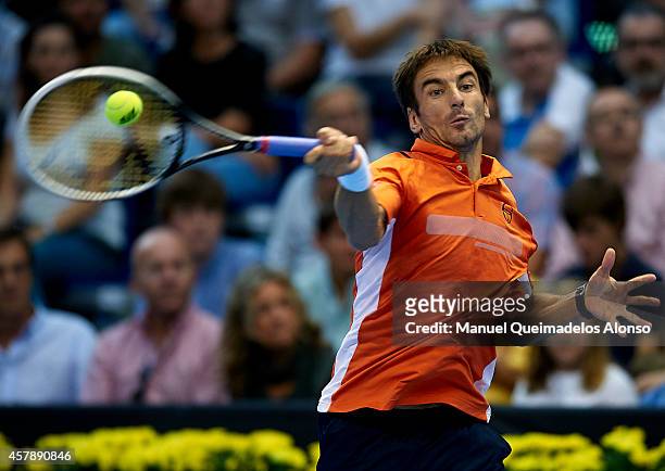 Tommy Robredo of Spain in action against Andy Murray of Great Britain in the final during day seven of the ATP 500 World Tour Valencia Open tennis...
