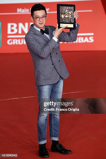 Xu Ang attends the Festival Closing Photocall during the 9th Rome Film Festival on October 25, 2014 in Rome, Italy.