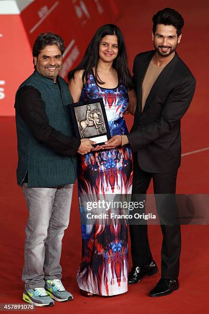 Vishal Bhardwaj, Amrita Pandey and Shahid Kapoor pose with the People's Choice Award Mondo Genere at the 9th Rome Film Festival on October 25, 2014...