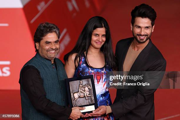 Vishal Bhardwaj, Amrita Pandey and Shahid Kapoor pose with the People's Choice Award Mondo Genere at the 9th Rome Film Festival on October 25, 2014...