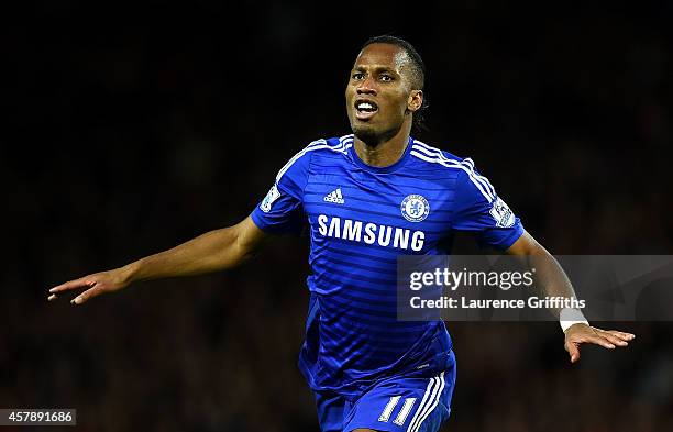 Didier Drogba of Chelsea celebrates scoring the first goal during the Barclays Premier League match between Manchester United and Chelsea at Old...