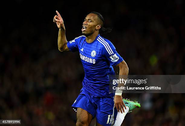 Didier Drogba of Chelsea celebrates scoring the first goal during the Barclays Premier League match between Manchester United and Chelsea at Old...