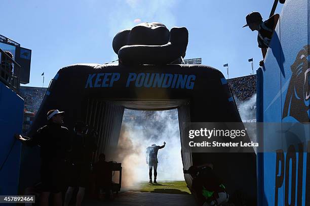 Cam Newton of the Carolina Panthers exits the tunnel before the game against the Seattle Seahawks at Bank of America Stadium on October 26, 2014 in...