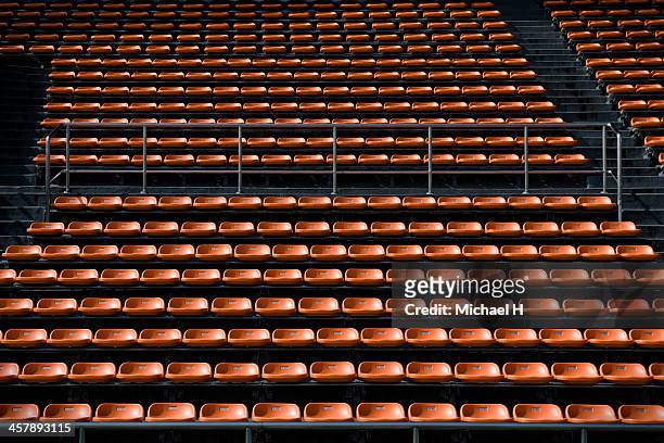 empty bench in stadium - bleachers stock pictures, royalty-free photos & images