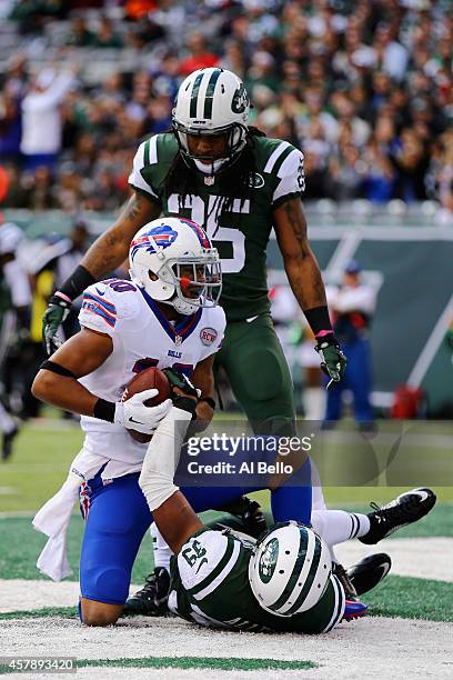 Robert Woods of the Buffalo Bills scores a first quarter touchdown against Antonio Allen of the New York Jets at MetLife Stadium on October 26, 2014...