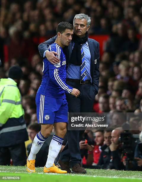 Chelsea Manager Jose Mourinho embraces Eden Hazard during the Barclays Premier League match between Manchester United and Chelsea at Old Trafford on...