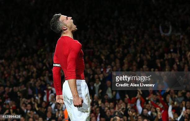 Robin van Persie of Manchester United celebrates scoring the equalising goal during the Barclays Premier League match between Manchester United and...