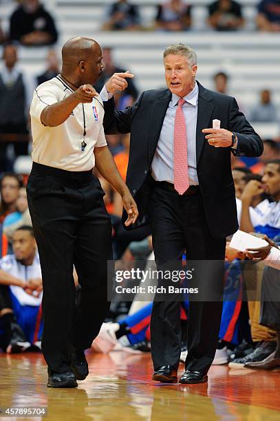 Head coach Brett Brown of the Philadelphia 76ers reacts to a call during a preseason game against the New York Knicks at the Carrier Dome on October...