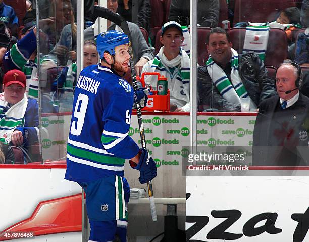 Zack Kassian of the Vancouver Canucks argues with a referee as he steps into the penalty box during their NHL game against theTampa Bay Lightning at...