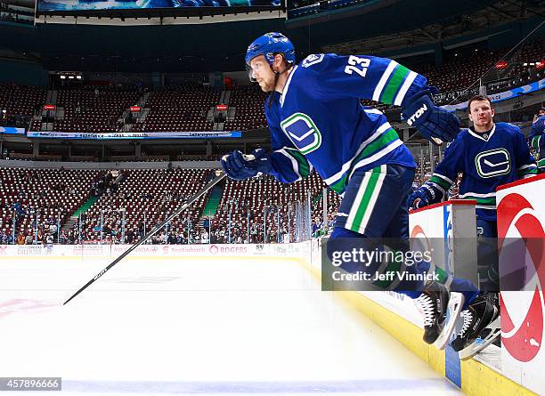 Alexander Edler of the Vancouver Canucks steps onto the ice during their NHL game against theTampa Bay Lightning at Rogers Arena October 18, 2014 in...