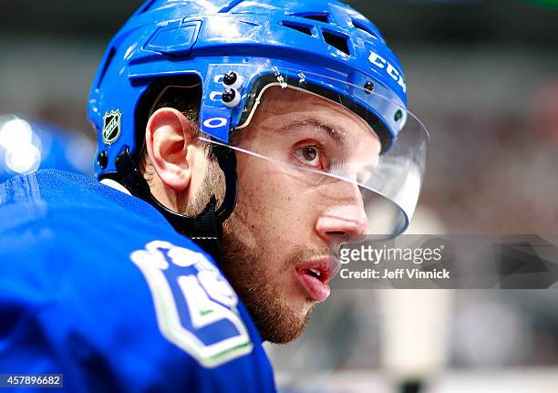 Nick Bonino of the Vancouver Canucks looks on from the bench during their NHL game against theTampa Bay Lightning at Rogers Arena October 18, 2014 in...