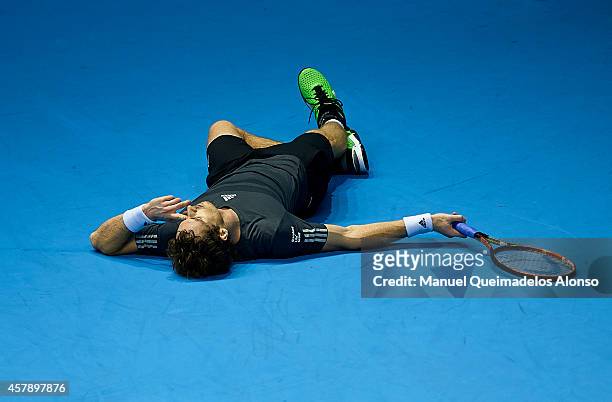 Andy Murray of Great Britain falls over in his match against Tommy Robredo of Spain in the final during day seven of the ATP 500 World Tour Valencia...
