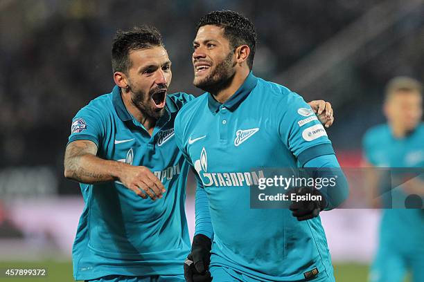 Hulk of FC Zenit St. Petersburg celebrates his goal with Miguel Danny of FC Zenit St. Petersburg during the Russian Football League Championship...