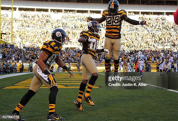 Markus Wheaton celebrates his touchdown with Le'Veon Bell of the Pittsburgh Steelers during the first quarter against the Indianapolis Colts at Heinz...