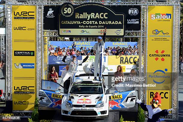 Sebastien Ogier of France and Julien Ingrassia of France celebrate their Worl Rally Champion title on the final podium during Day Three of the WRC...