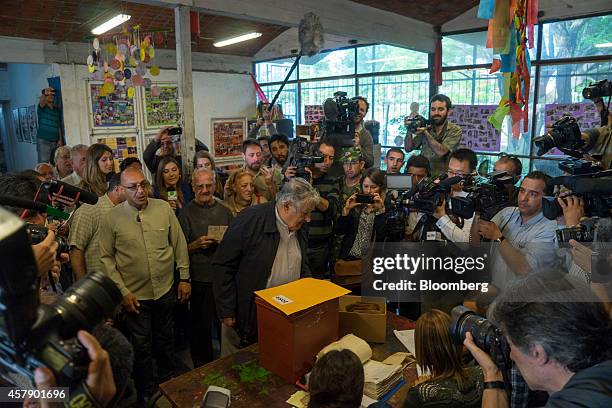 Jose Mujica, Uruguay's president, casts his ballot at a polling station in Montevideo, Uruguay, on Sunday, Oct. 26, 2014. Polls show the vote will...