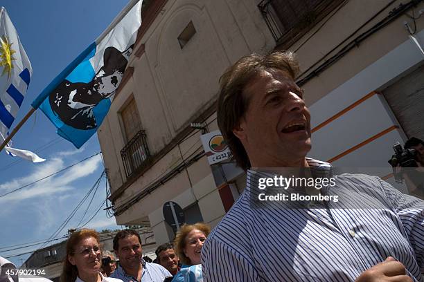 Candidate for president Luis Lacalle Pou greets supporters outside of a polling station in Canelones, Uruguay, on Sunday, Oct. 26, 2014. Polls show...