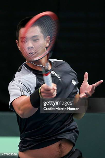 Chieh-Fu Wang of Chinese Taipaei in action against Michael Venus of New Zealand in his match during day one of the Davis Cup tie between New Zealand...