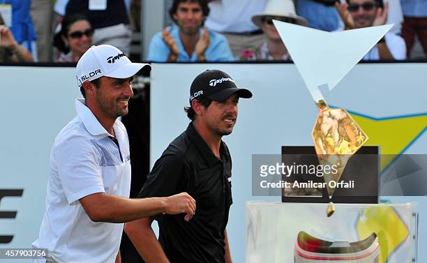 Rafael Echenique and Puma Dominguez of Argentina smile after winning the America's Golf Cup as part of PGA Latinoamerica tour at Olivos Golf Club on...
