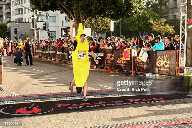 General view of a runner preparing to cross the finish line at the Rock 'n' Roll Los Angeles Halloween Half-Marathon and 5K benefitting the ASPCA on...