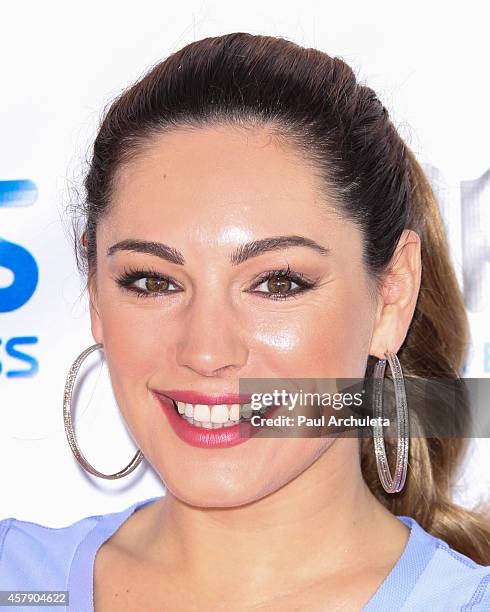 Model / Actress Kelly Brook attends the Skechers "Pier To Pier Friendship Walk" at Manhattan Beach Pier on October 26, 2014 in Manhattan Beach,...