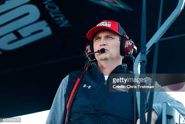 Steve Letarte, crew chief of the National Guard Chevrolet, looks on from the pit box during the NASCAR Sprint Cup Series Goody's Headache Relief Shot...