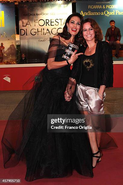 Maria Grazia Cucinotta and Chiara Giordano attend the 'Il Postino' Red Carpet during the 9th Rome Film Festival on October 26, 2014 in Rome, Italy.