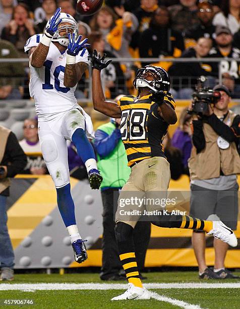 Donte Moncrief of the Indianapolis Colts catches a 31 yard touchdown pass in front of Cortez Allen of the Pittsburgh Steelers during the third...