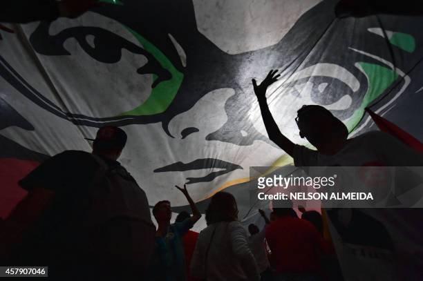 Hundreds of supporters celebrate the reelection of the Brazilian President and presidential candidate for the Workers Party Dilma Rousseff in the...