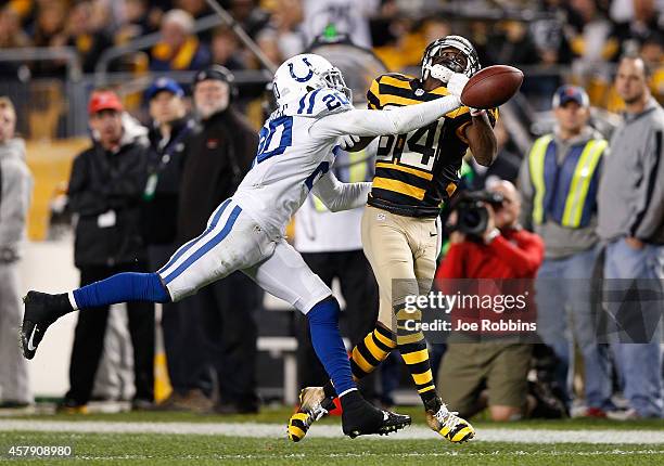 Darius Butler of the Indianapolis Colts breaks up a pass intended for Antonio Brown of the Pittsburgh Steelers during the fourth quarter at Heinz...