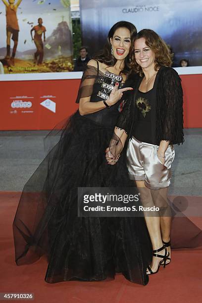 Maria Grazia Cucinotta and Chiara Giordano attend the "Il Postino" red carpet during the 9th Rome Film Festival on October 26, 2014 in Rome, Italy.