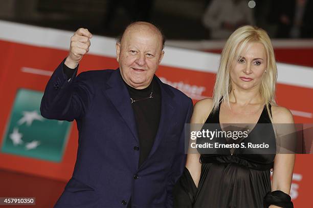 Massimo Boldi and Loredana De Nardis attend the "Il Postino" red carpet during the 9th Rome Film Festival on October 26, 2014 in Rome, Italy.