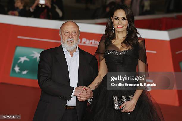 Renato Scarpa and Maria Grazia Cucinotta attend the "Il Postino" red carpet during the 9th Rome Film Festival on October 26, 2014 in Rome, Italy.