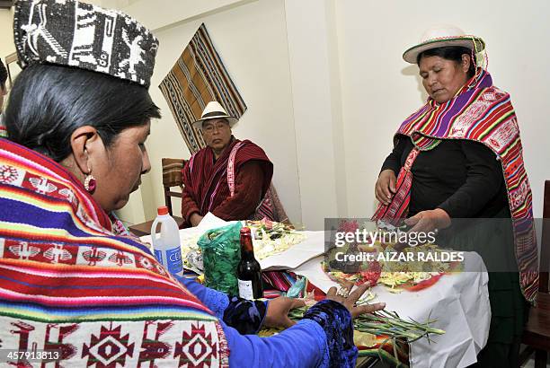 "Amautas" prepare a table to call the "Ajayu" of a patient on December 5, 2013 at the Agromont Hospital in El Alto, 12 km from La Paz. The hospital...