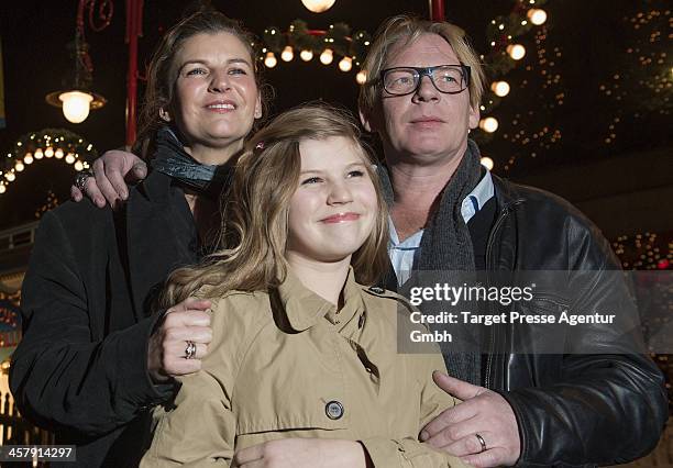 Ben Becker, Lilith Becker and his wife Astrid Seidl attend the 10th Roncalli Christmas Circus at Tempodrom on December 19, 2013 in Berlin, Germany.