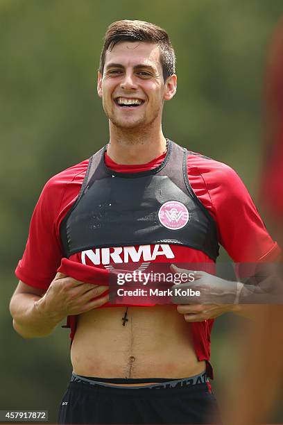 Tomi Juric shares a laugh with a team mate during a Western Sydney Wanderers ACL training session at Blacktown International Sportspark on October...