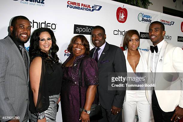 Basketball player Chris Paul , Jada Crawley and family attend the CP3 Foundation celebrity server dinner at Mastro's Steakhouse on October 26, 2014...
