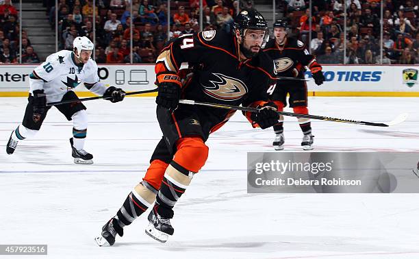 Nate Thompson of the Anaheim Ducks skates up ice playing in his 400th game against the San Jose Sharks on October 26, 2014 at Honda Center in...